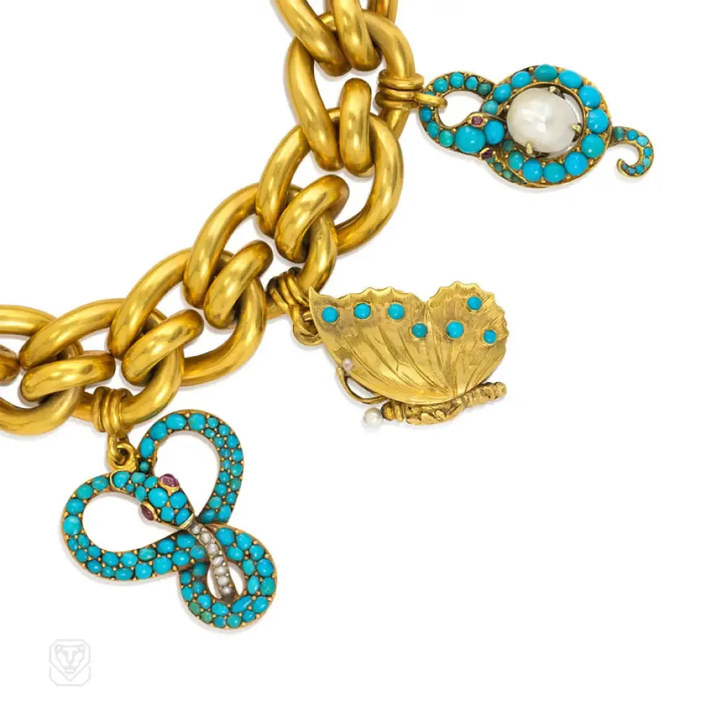 Antique gold bracelet with turquoise and pearl-set charms