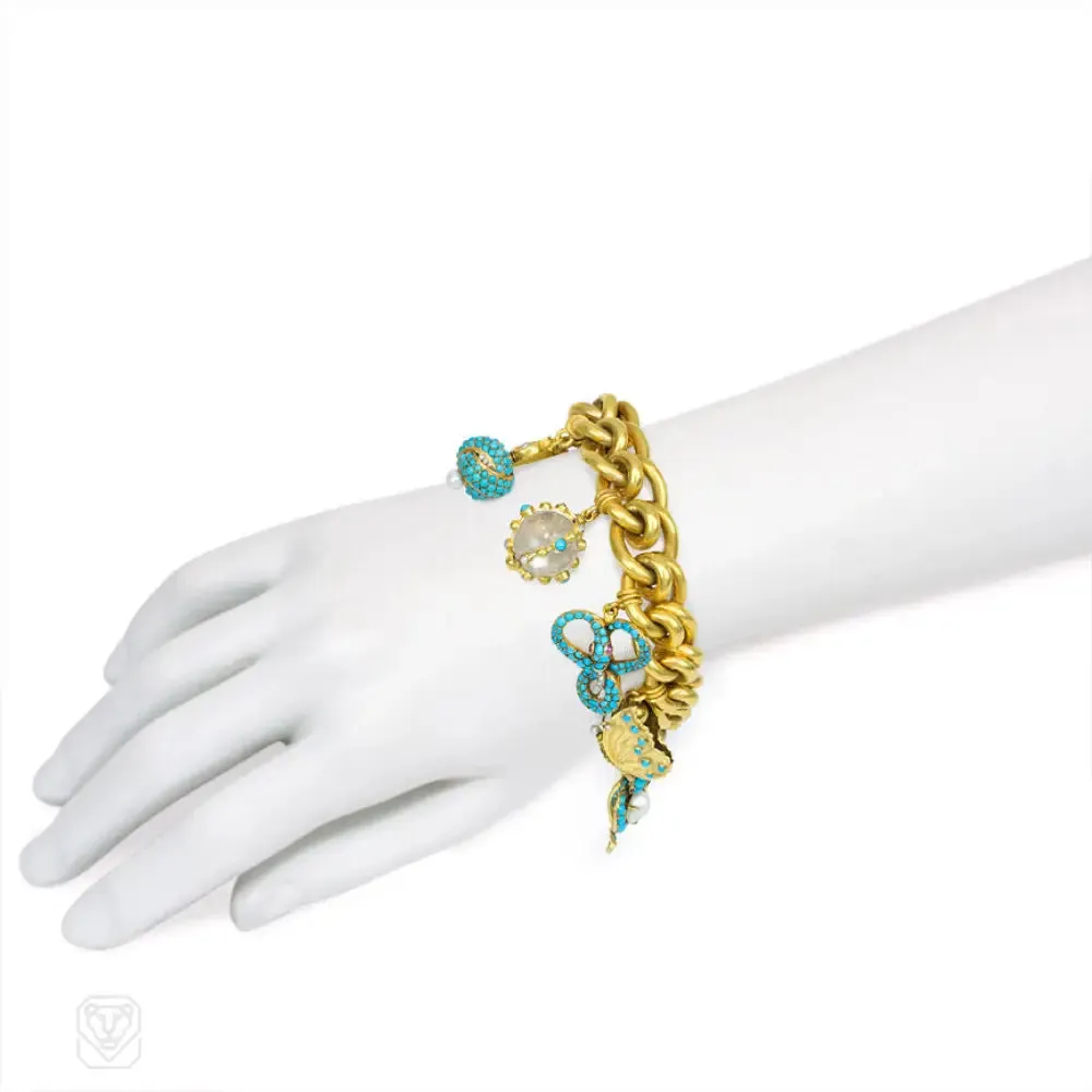 Antique gold bracelet with turquoise and pearl-set charms