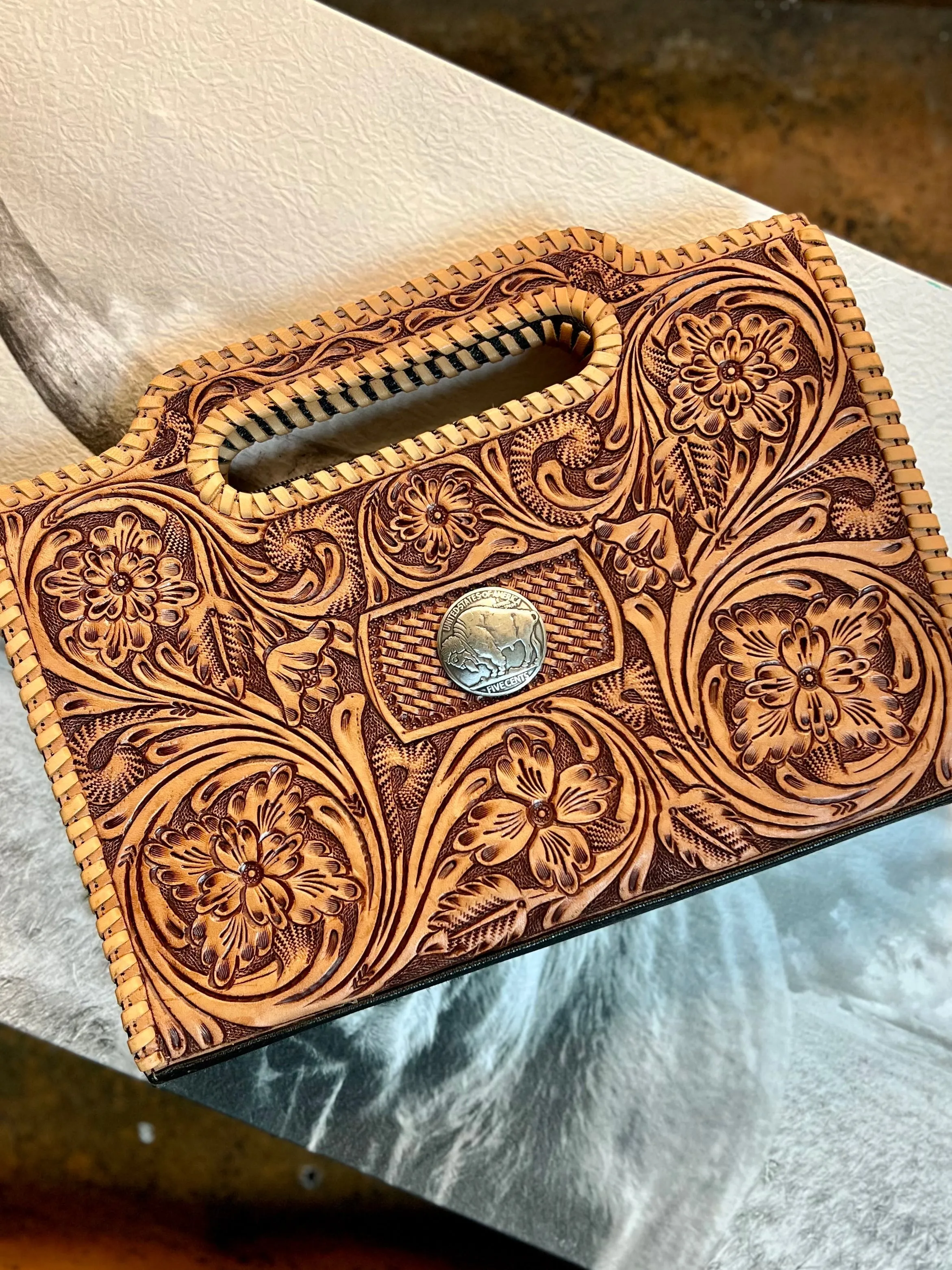 Bison Tooled Leather Clutch Bag