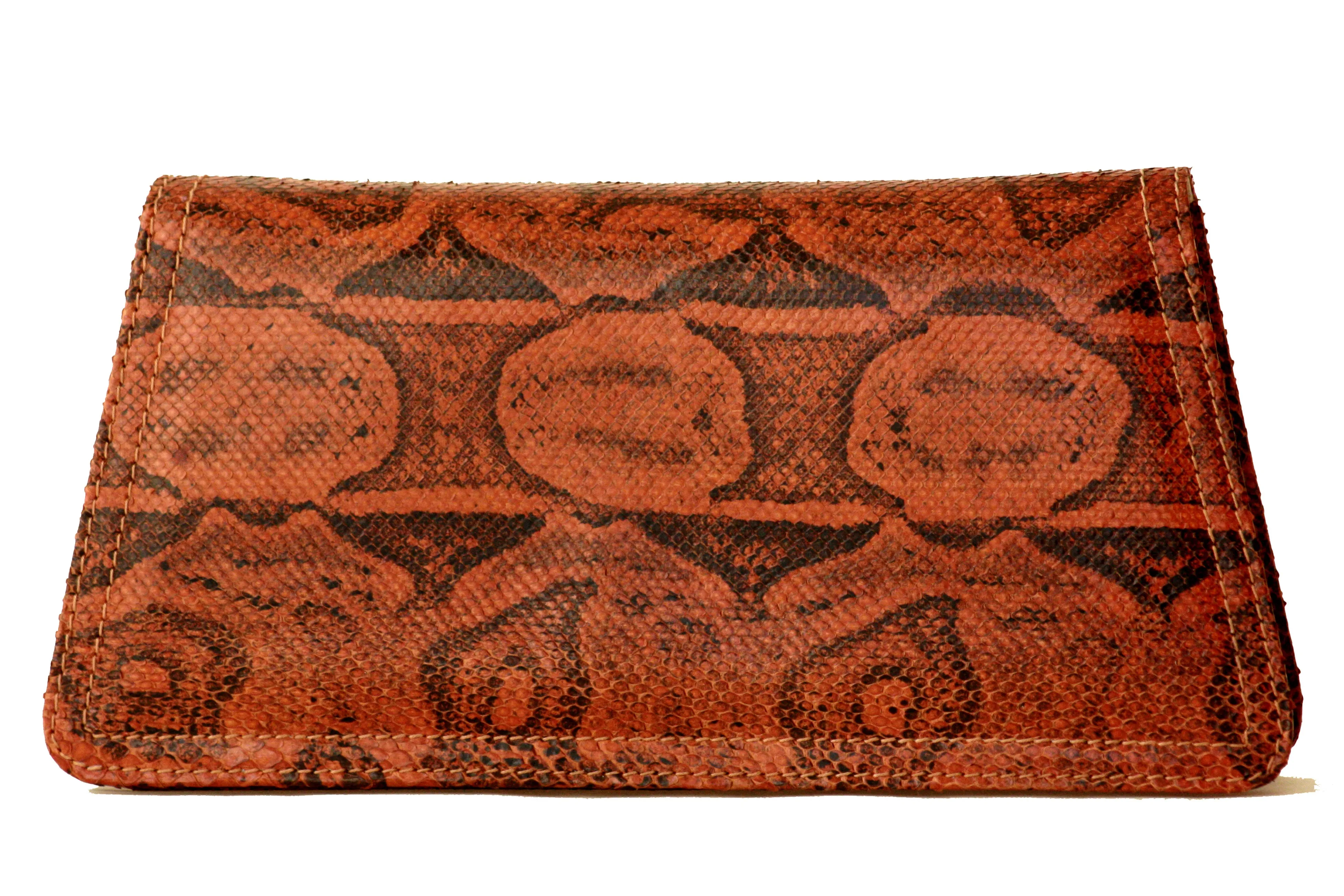 DORCA orange-brown snake skin clutch